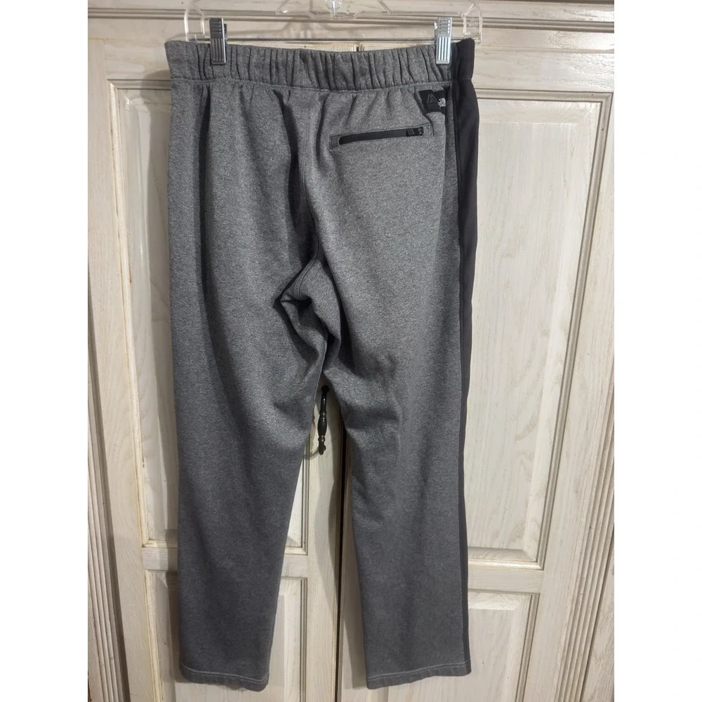 The North Face Mens Med Mountain Athletics Tapered Sweatpants Gray Pocket